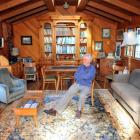 Kevin Hayward reflects on his career, seated in a wood-lined room he helped build above his...