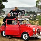 Kevin Heyward with his cute ute, a 1957 Austin A35 pick-up with Austin J40 pedal car on the roof....