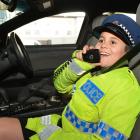 Kieran Rotarangi (9), of Dunedin, sees if the job fits during the New Zealand Police Open Day at...