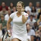 Kim Clijsters of Belgium celebrates after defeating Andrea Hlavackova of the Czech Republic in...