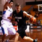 Kirk Penney takes the ball forward for the Tall Blacks against South Korea. (Photo by Phil Walter...