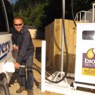 Kiwi Discovery and Queenstown Rafting general manager Tim Barke fills up at New Zealand's first...