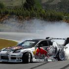 Kiwi drift star 'Mad Mike' Whiddett drifts his Mazda RX7 around Highlands Motorsport Park's track...