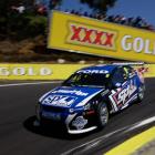 Kiwi young gun Shane van Gisbergen hammers over a rise on the mountain at this year's Bathurst...