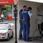 Constable Nathan White and Acting Sergeant Karl Hemmingsen, of Dunedin, speak to a man after he...