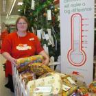 Kmart Wishing Tree Appeal organiser Dawn Barnes with some of the gifts people have donated to the...