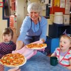 Koputai Early Childhood Centre's chef Leonie Thorneycroft serves lunch for children Lulu McLane ...