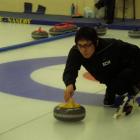 Korea team member Kim Soo-hyuk delivers a stone against New Zealand at the Maniototo Curling...