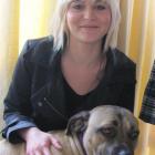 Krystal Lucas (19), of Wanaka, with Neapolitan  mastiff-pit bull cross Bella. Photo by Marjorie...