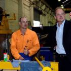 Labour Party leader David Shearer (right) talks to James Hardisty, of Wilson Electrical, during a...