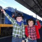 Lachlan (7) and Josh Cronin (5), of Tapanui, celebrate after a ride on the Cadbury Crunchie Gold...