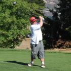 Lake Hawea golfer Rick Johnston plays a shot during the Wanaka Charity Golf Classic, an event...