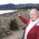 Lake Hawea resident Barbara Chinn points towards the area where a place surveyed many years ago...