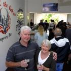 Lake Waihola Tavern publicans Kevin and Annette Reid toast the opening of their temporary bar...