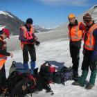 LandSAR members Emma Fleming, John Taylor, Rod Walker and Alan Gillespie prepare to search for a...