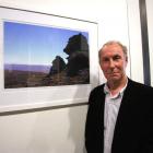 Landscape artist Grahame Sydney, of Cambrian, with a photograph of the Mackenzie Basin at...