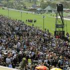 Large crowds wait for the big race on Melbourne Cup Day at Flemington Racecourse, in Melbourne,...