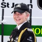 Laura Fleming wears the ceremonial gold aiguillette of St John cadet of the year. Photo by Craig...