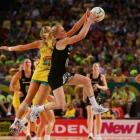Laura Langman of New Zealand and Renae Hallinan of Australia compete for the ball.  (Photo by...
