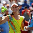 Laura Robson of Britain prepares to hit balls to fans after defeating Li Na of China during their...