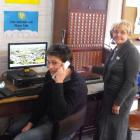Lawrence Information Centre manager Elsie Thomson tries out the old Lawrence telephone exchange...