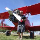 Les Lamb stands beside the biplane which has been creating plenty of interest at the Omarama...