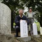 Les Wong (left), a Dunedin resident active in Chinese grave restoration, and Stewart Harvey, who...