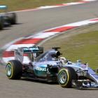 Lewis Hamilton leads Nico Rosberg around a bend. REUTERS/Aly Song