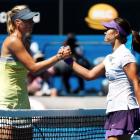 Li Na of China (R) shakes hands with Maria Sharapova of Russia after defeating her in their women...