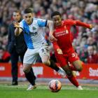 Liverpool's Raheem Sterling (R) contests the ball with Blackburn Rovers' Craig Conway. Reuters /...
