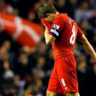 Liverpool's Steven Gerrard leaves the pitch after his team lost to Swansea in their English...