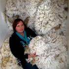 Liz Wright with fleeces at Earnscleugh Station. She is inviting young Otago women to enter the...