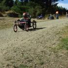 Logan Morrell (11), of Kaitangata, breaks last year's trolley derby speed record on his first run...