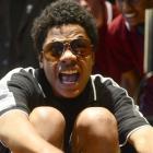 Logan Park High School pupil Daniel Vagi (14) helps his team win the junior boys event at the...