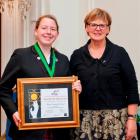 Logan Park High School pupil Meran Campbell-Hood with Royal Society of New Zealand acting chief...