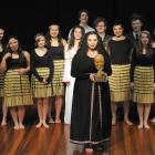 Logan Park High School pupil Reva Grills (17), and the cast, with the Sheilah Winn Award won by...