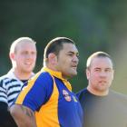 Looking on at an Otago training session at Logan Park in Dunedin yesterday are Kees Meeuws ...