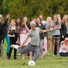 Louis Tomlinson shows off his soccer skills in an impromptu game in Christchurch to adoring fans ...