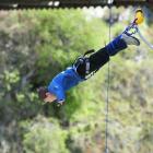 Luke Williams (11), of Australia, executes a graceful bungy jump off the Kawarau bridge on...