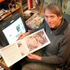 Lyall Smillie, of Queenstown, shows an article he has written about the discovery of an 85kg lump...