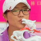 Lydia kisses the trophy after winning the Swinging Skirts 2013 World Ladies Masters in Taiwan....