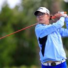 Lydia Ko follows her tee shot on the fourth hole. Photo Getty Images