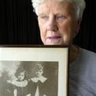 Lynley Mackenzie, of Halfway Bush, with a photo of her father, Harry Ham [left] and her uncle,...