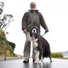 Macandrew Bay resident David Tordoff, pictured here with his border collie Bob, does not approve...