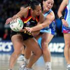 Magic's Frances Solia, left, and Southern Steel's Erika Burgess contest the ball. NZPA / Dianne...