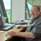 Malcolm Jones in the scorers' box at the University Oval yesterday. Photo by Linda Robertson.