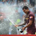 Manchester City's Carlos Tevez celebrates his team's victory over Chelsea in their English...