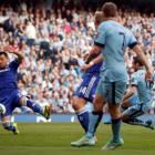 Manchester City's Frank Lampard (R) shoots to score against Chelsea during their match at the...