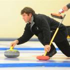Maniototo curler Sean Becker, the New Zealand men's skip, delivers a stone in the Ernslaw One...