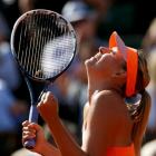 Maria Sharapova celebrates her win over Eugenie Bouchard. REUTERS/Vincent Kessler